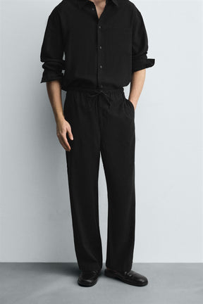 RELAXED FIT FLOWING TROUSERS - Image 2