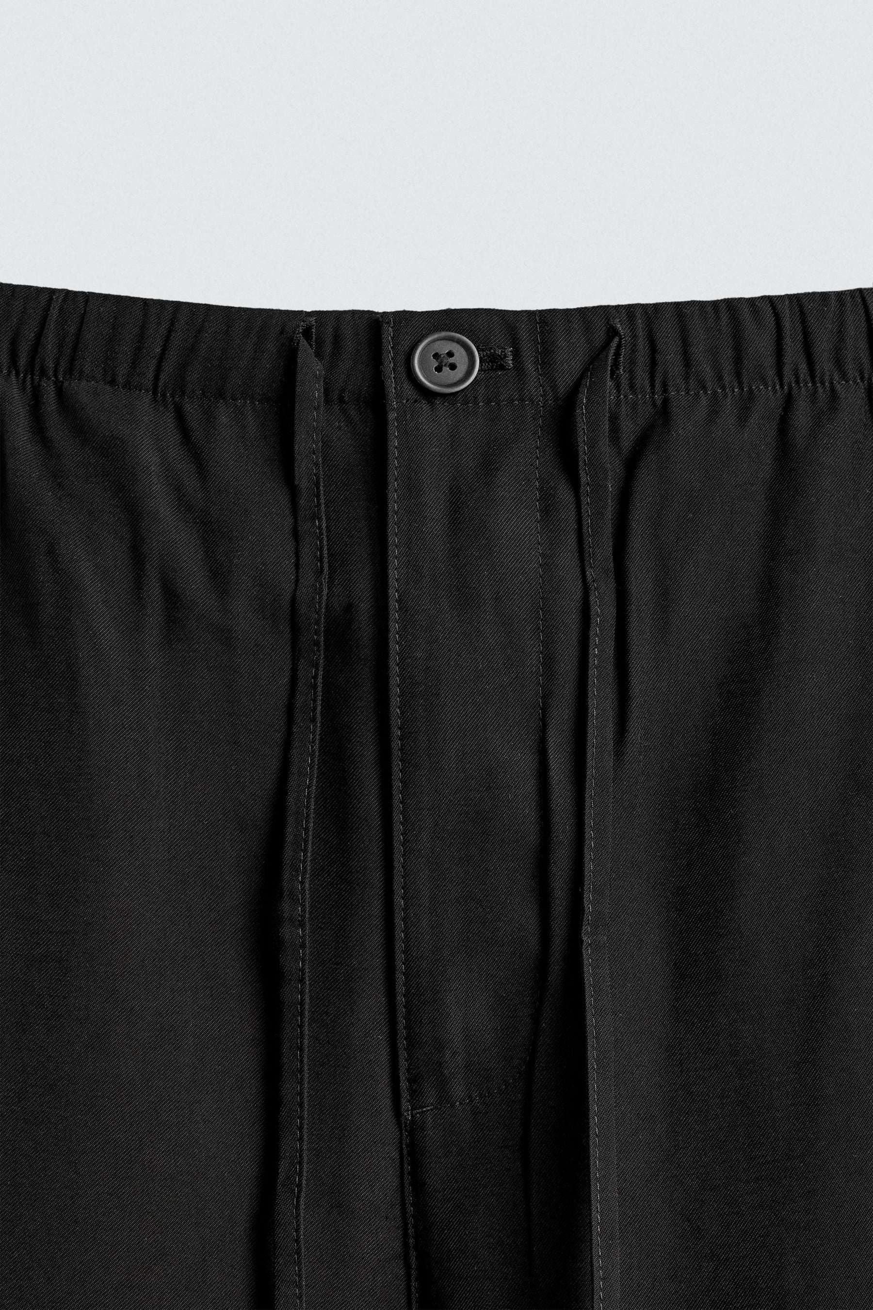 RELAXED FIT FLOWING TROUSERS - Image 9