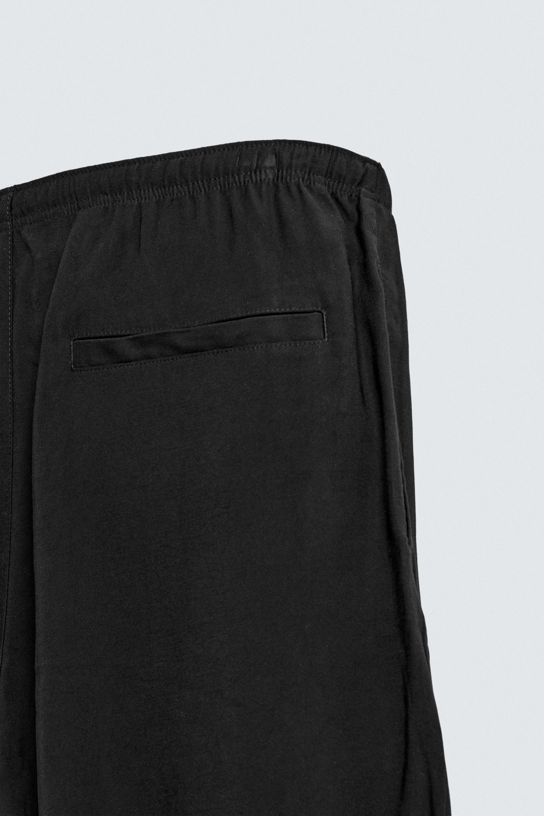 RELAXED FIT FLOWING TROUSERS - Image 10