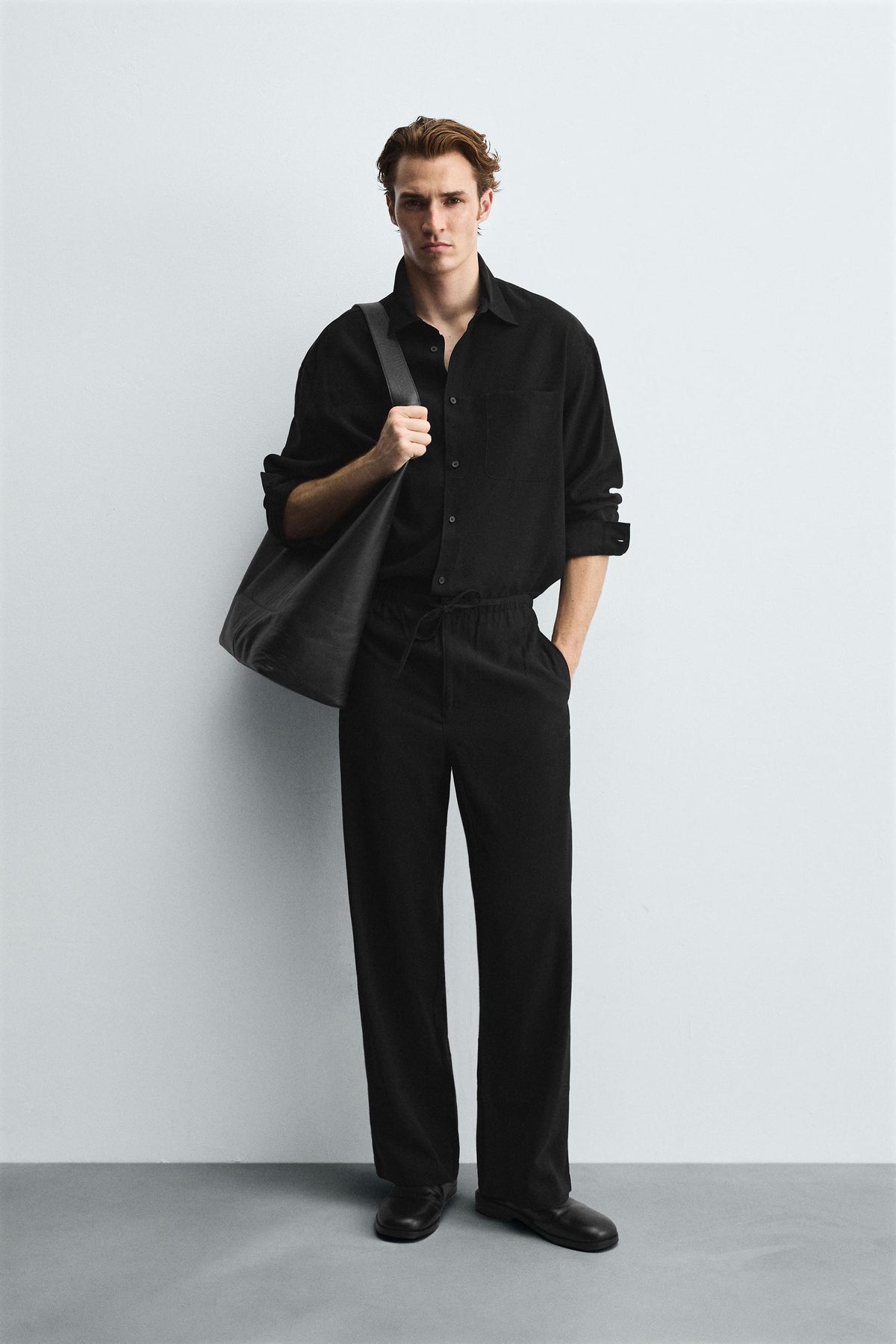 RELAXED FIT FLOWING TROUSERS - Image 1