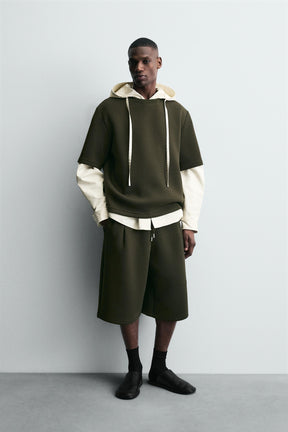 NEOPRENE-EFFECT BERMUDA SHORTS WITH DARTS - Image 1