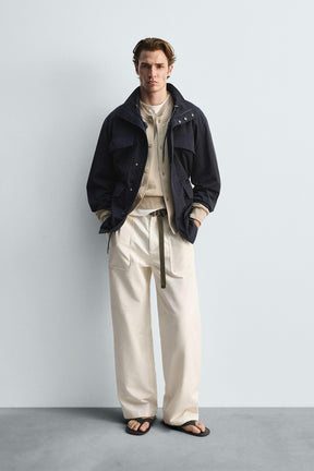 TECHNICAL PARKA WITH POCKETS - Image 1