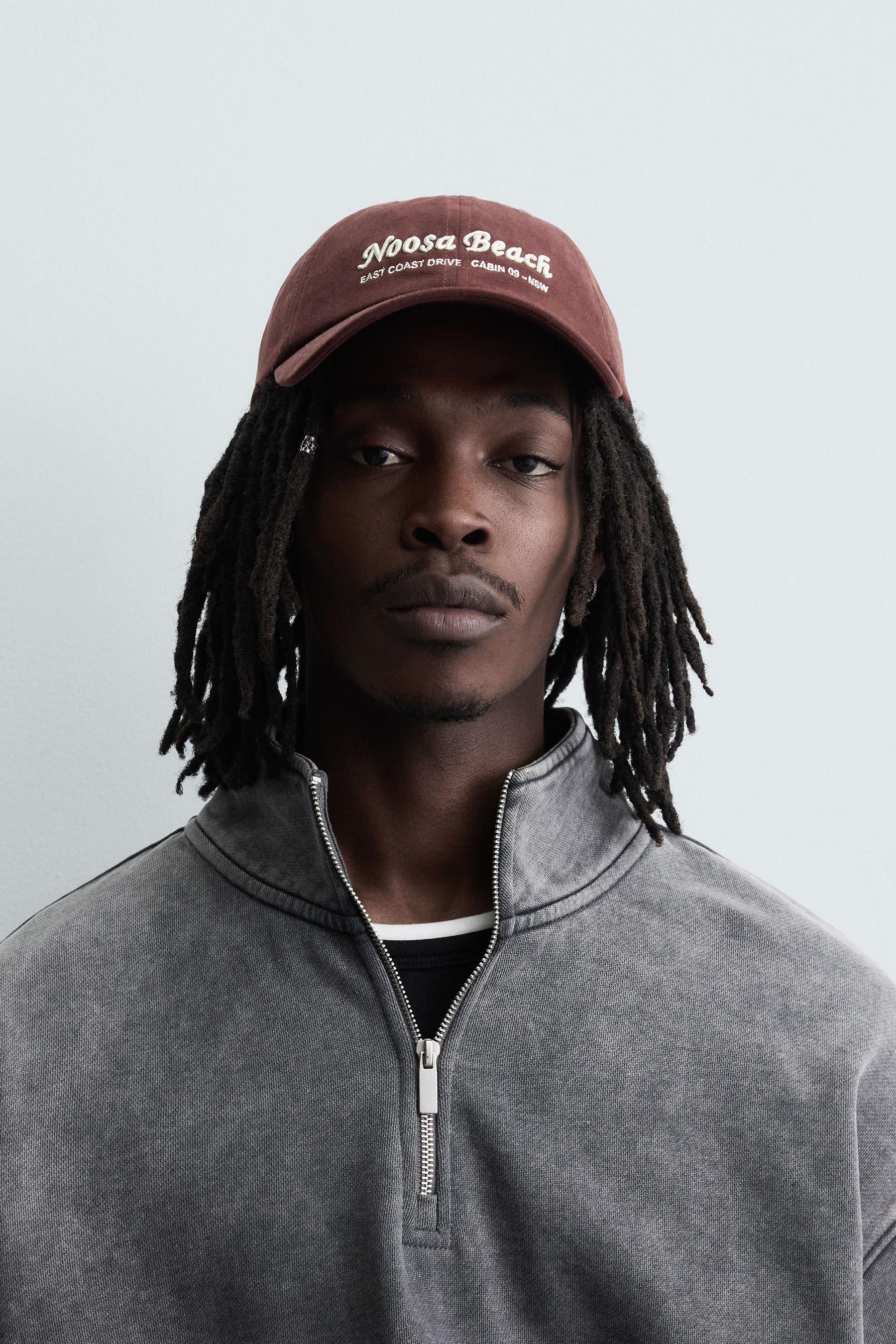 CAP WITH EMBROIDERED TEXT - Image 1