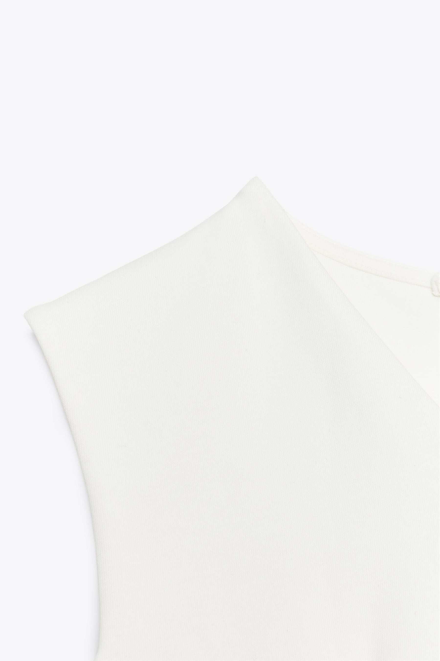 Sleeveless Peplum Top