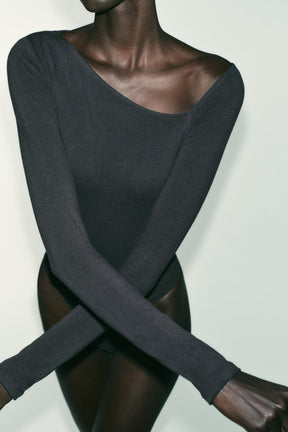 ASYMMETRIC LONG SLEEVE BODYSUIT