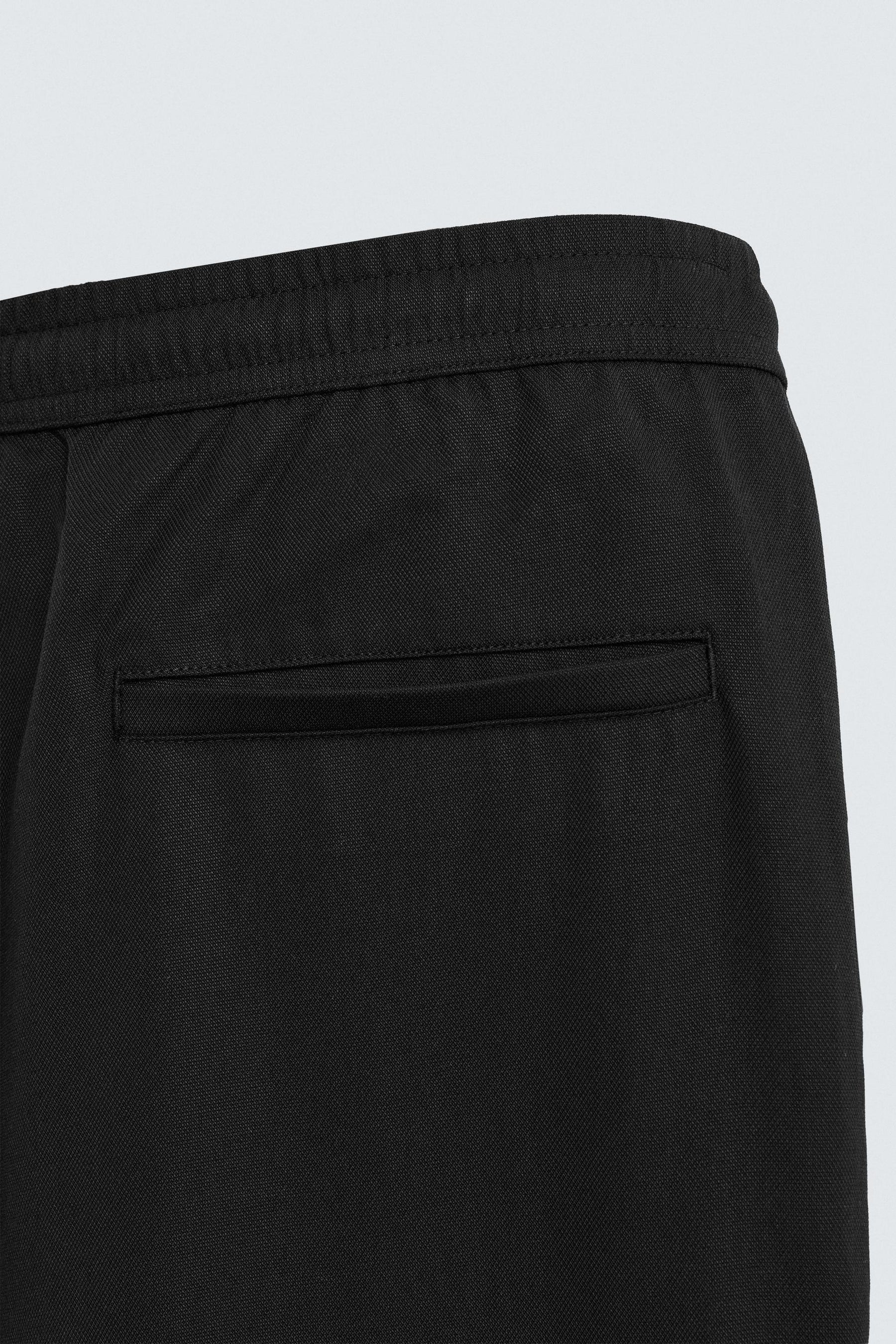 RELAXED FIT FLOWING TROUSERS - Image 9