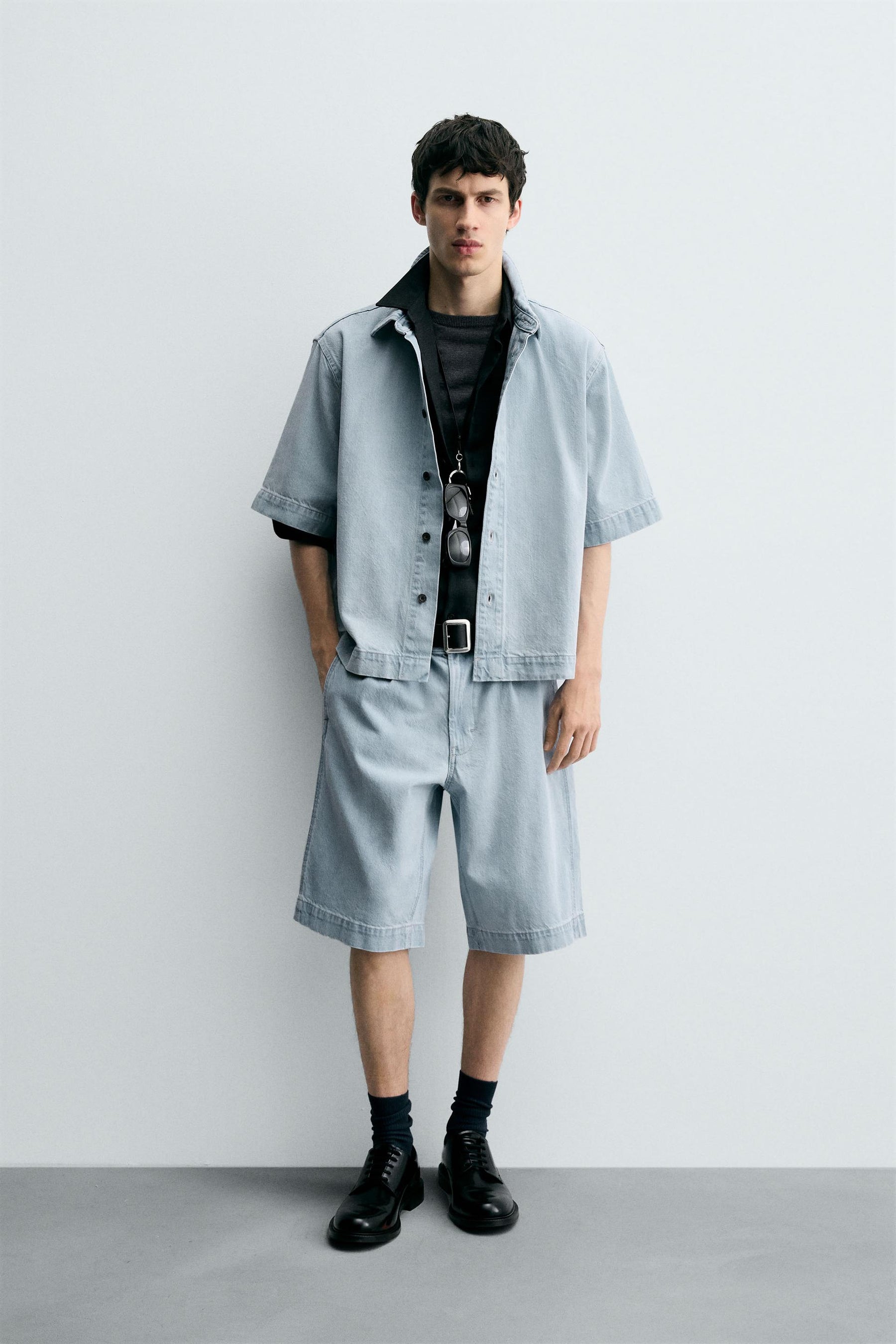 PLEATED RELAXED FIT DENIM BERMUDA SHORTS - Image 1