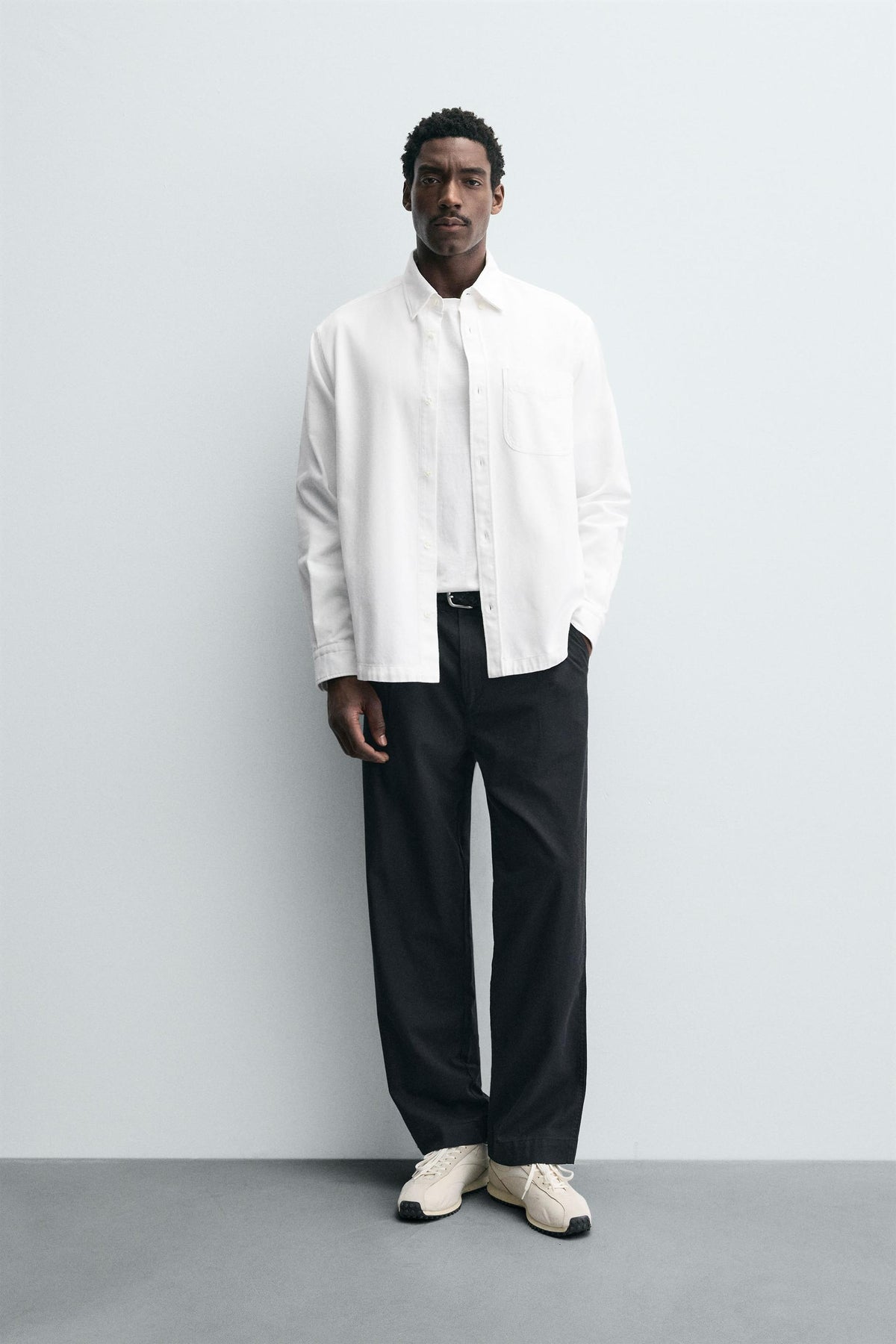 RELAXED FIT PLEATED TROUSERS - Image 1
