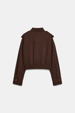 Shirt with shoulder tabs