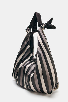 Satin-effect maxi bucket bag.